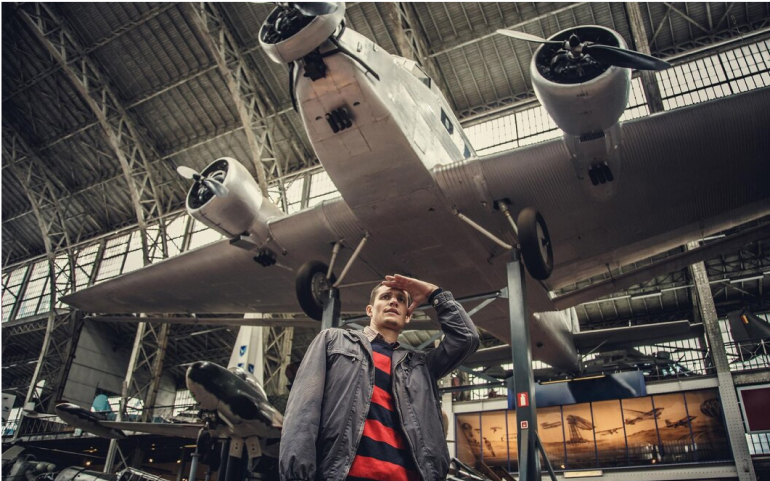 Man visiting an airplane exhibition